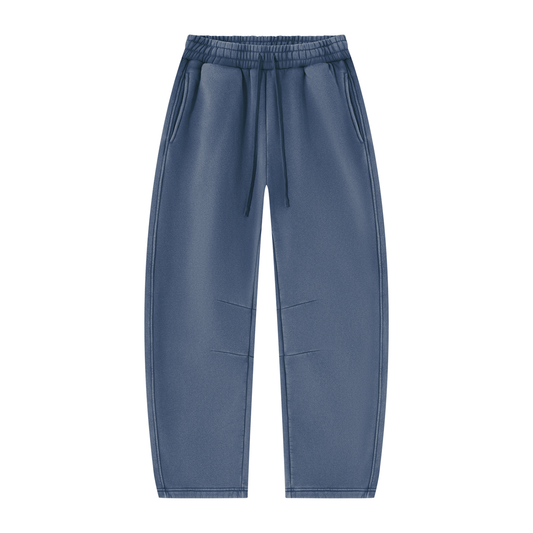 Wild Ones vintage wash barrel-leg sweatpants in washed blue, front with drawstring waist and pleats