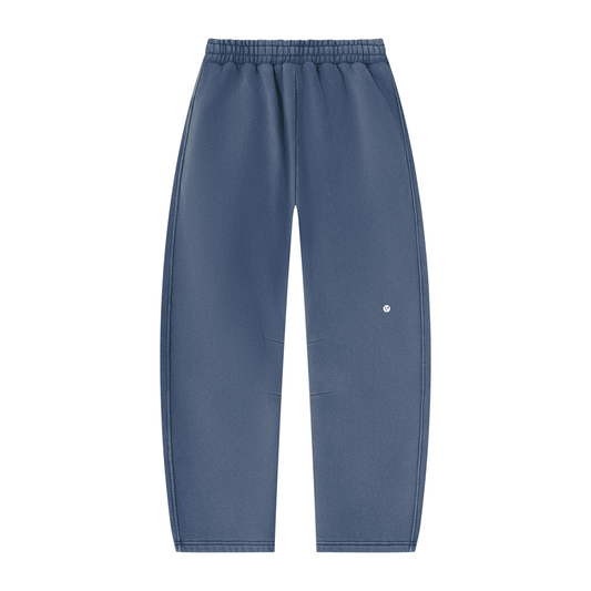 Wild Ones vintage wash barrel-leg sweatpants in washed blue, back with small Verdant V logo on the leg